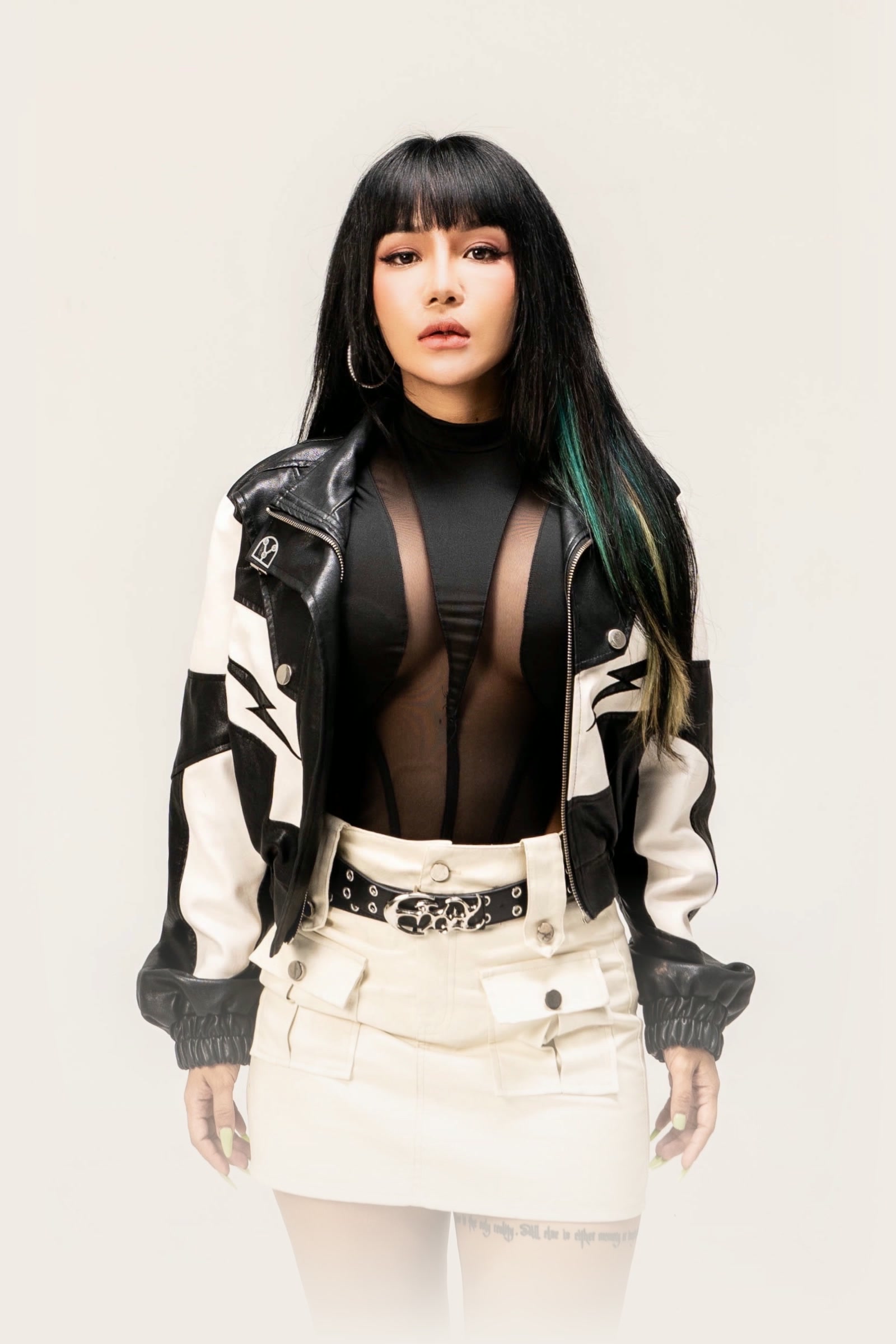 LOLLY in a white and black jacket